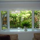 Here we replaced an old single pane window with a new double pane casement bay window.